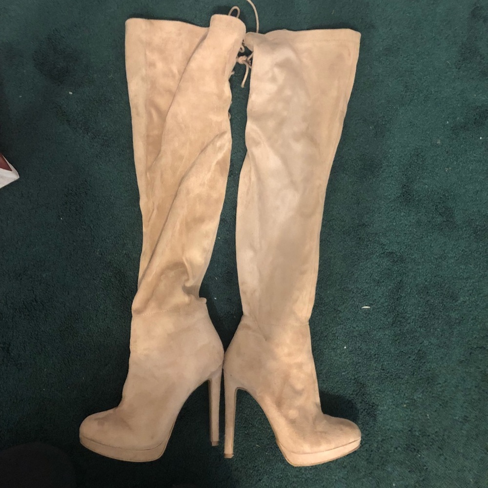 Knee high heeled boots